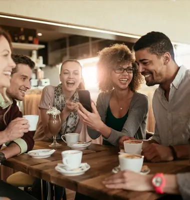 Group of friends having coffee together.