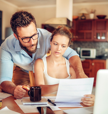 Couple studying their credit report