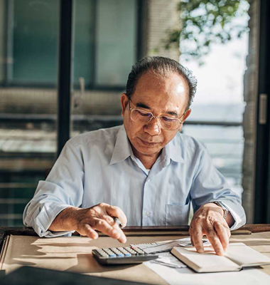 Elderly man going through finances