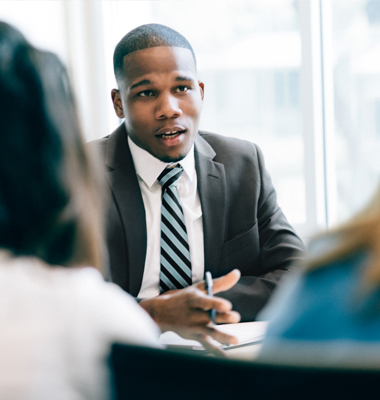 Banker consulting with clients.