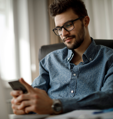 Man entering password on smartphone.