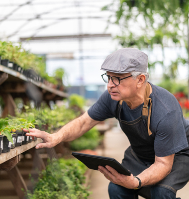 A man working in a plant shop