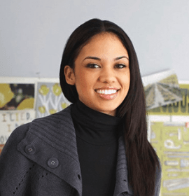 Portrait of young woman in casual business attire.