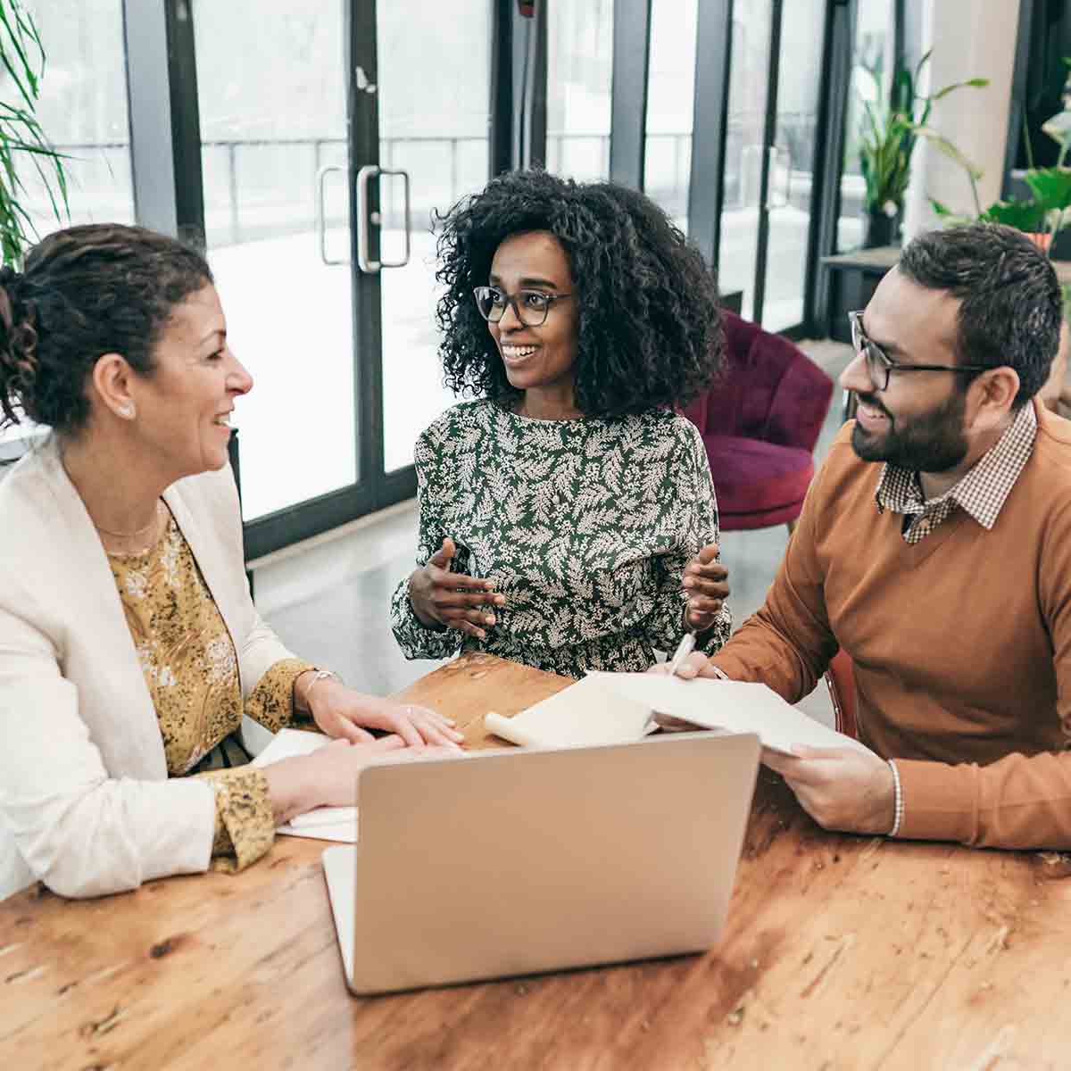 Couple meeting with a financial advisor to discuss retirement planning strategies