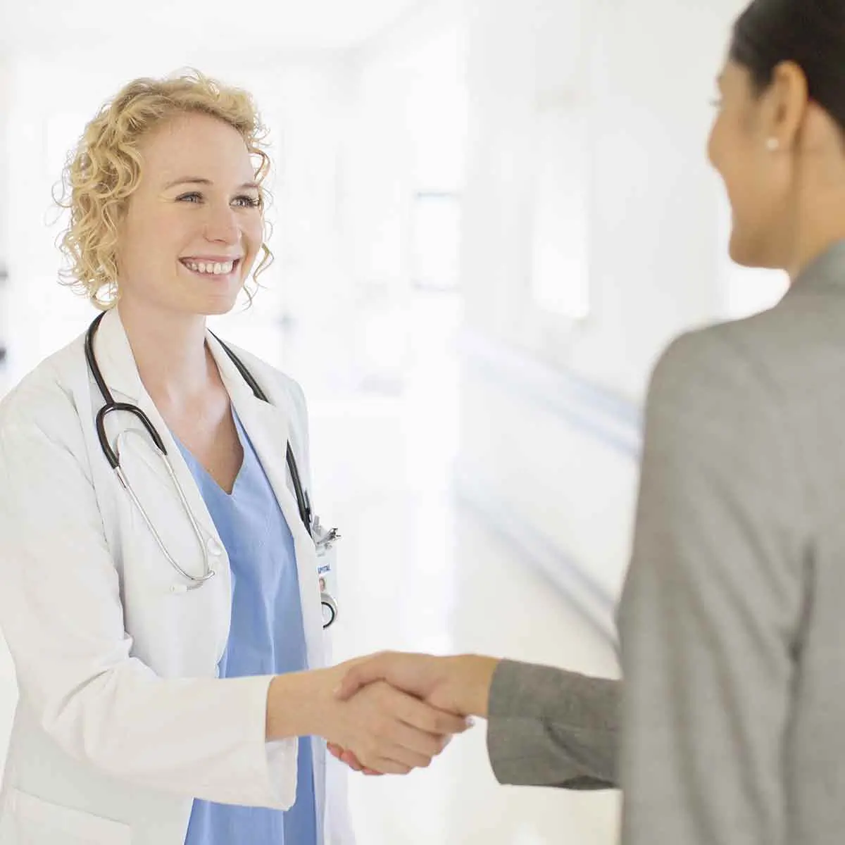 Medical practice owner meeting with a banker to build a strong financial partnership