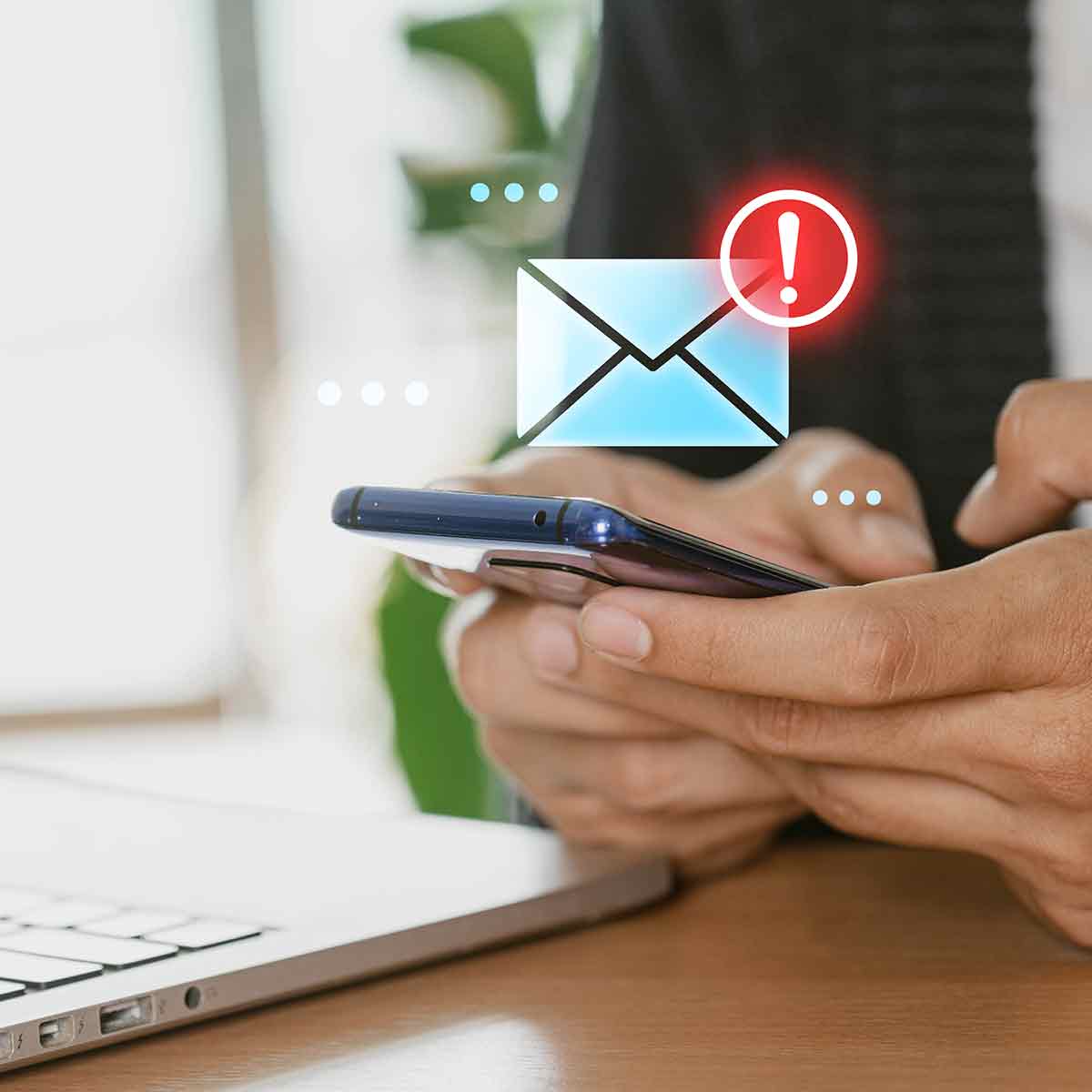 warning of a possible phishing attempt displayed on a smart phone