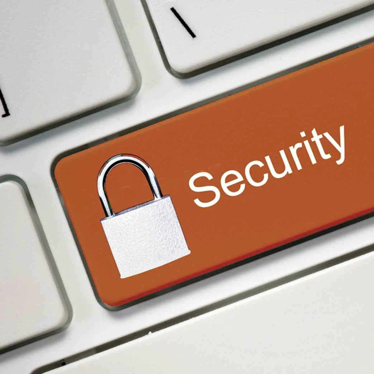 Computer keyboard featuring a lock icon, symbolizing 1st Source Bank’s commitment to security and fraud prevention for business clients