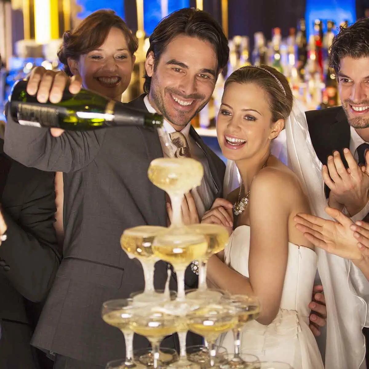 Elegant champagne fountain at a wedding reception; a celebration made possible by wedding budgeting and saving