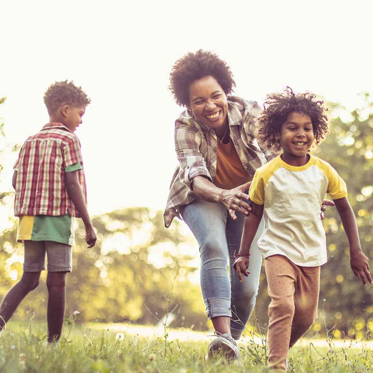 Happy family enjoying time together, symbolizing the importance of term life insurance for financial protection