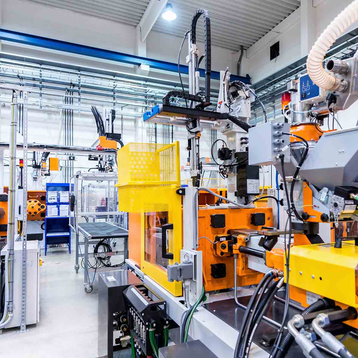 Industrial production line with advanced machinery on factory shop floor