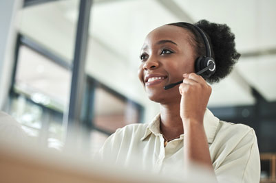 Customer service representative assisting retirement plan clients by phone