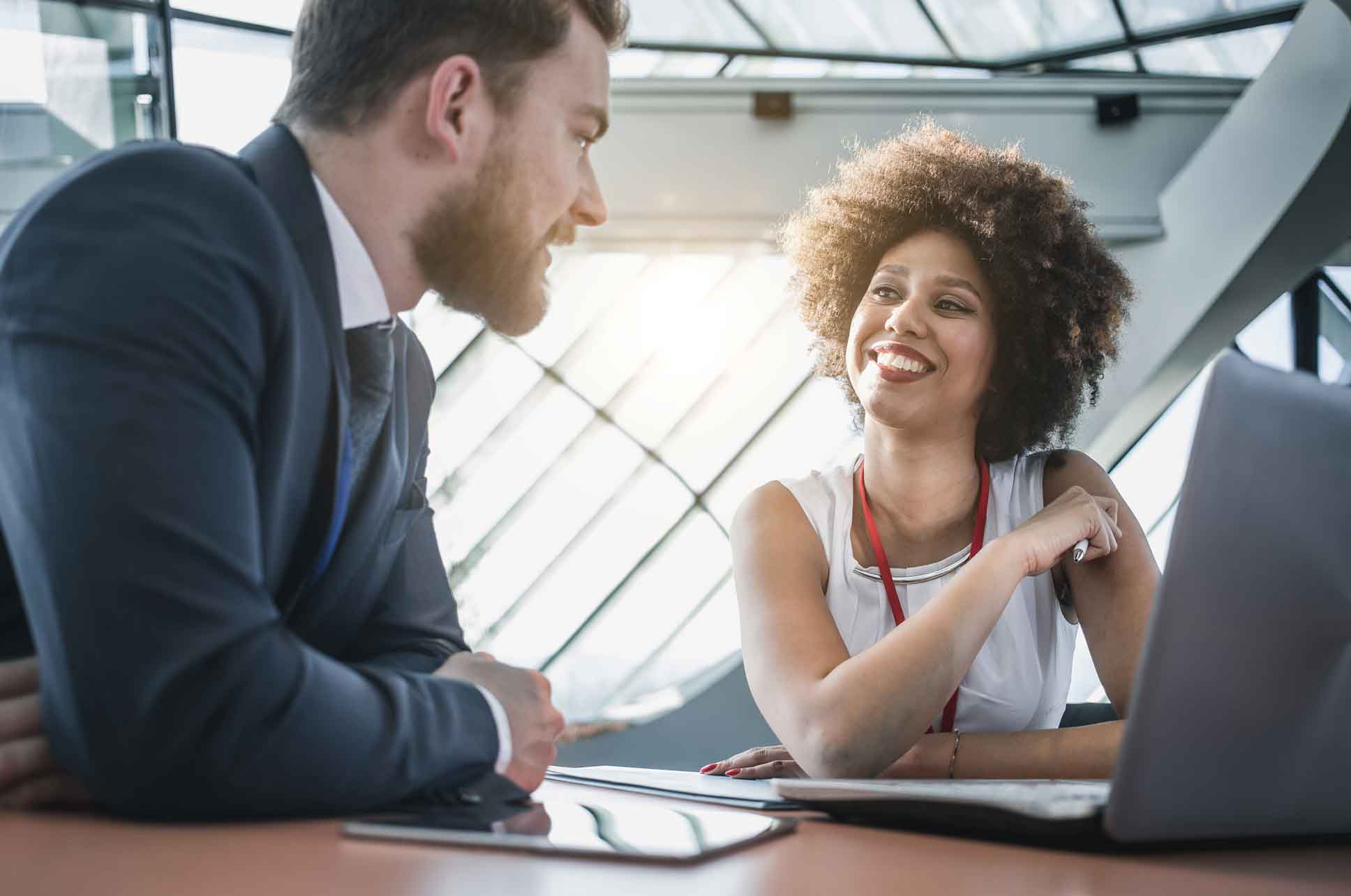A small business specialist meeting with a client