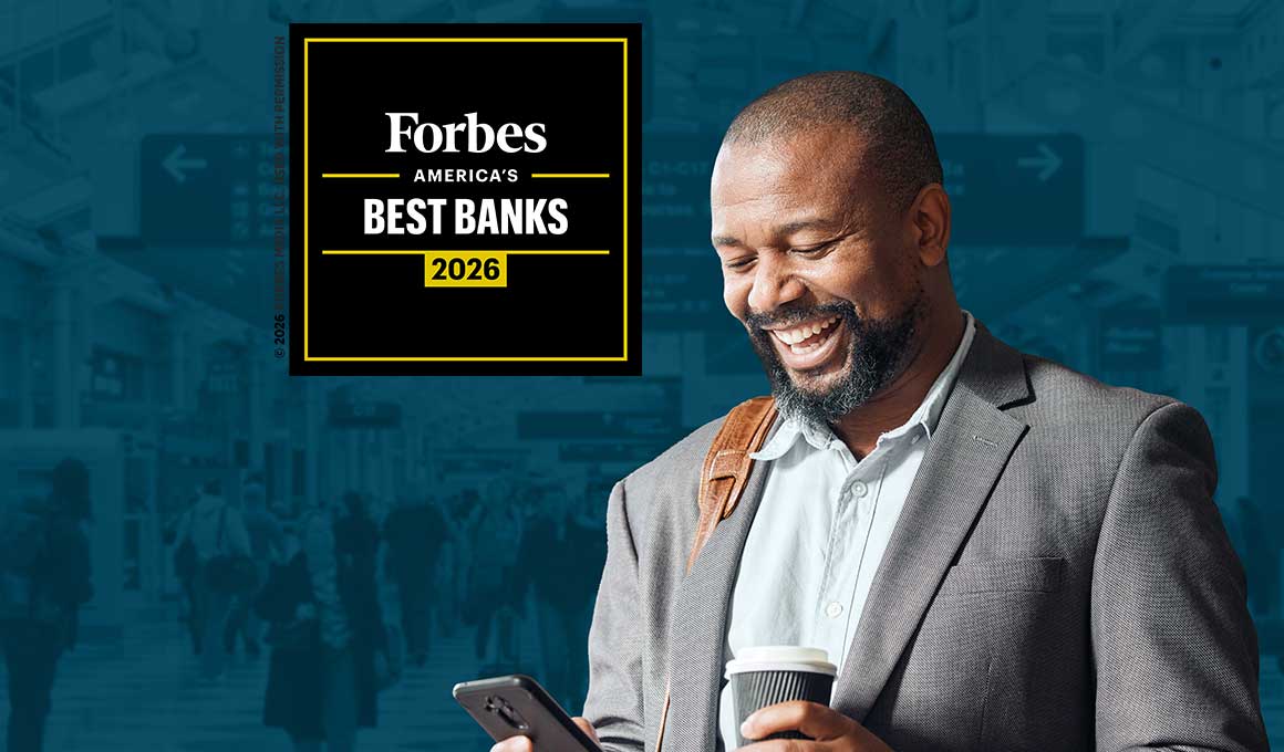 Man using his cell phone to log into the online and mobile business banking app