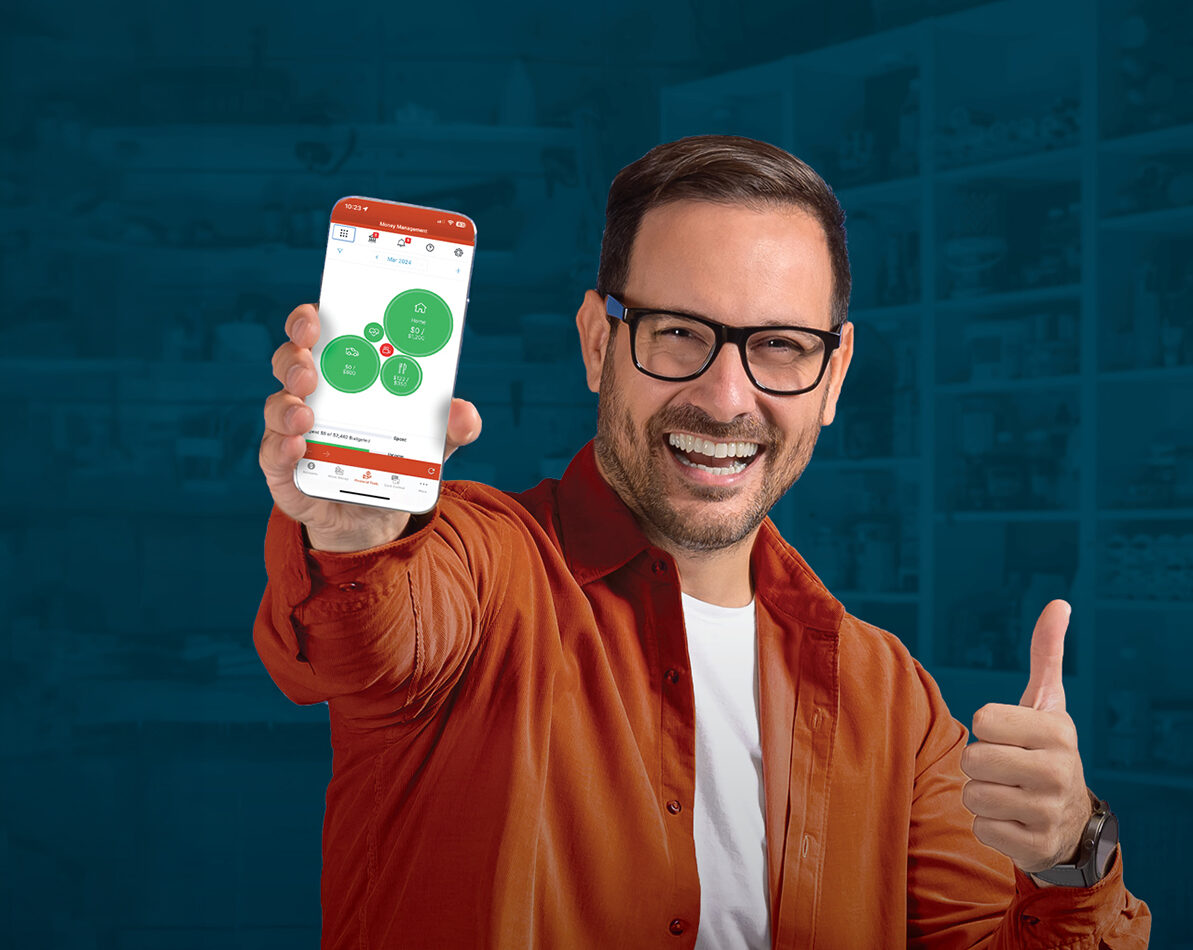 Man using the 1st Source mobile banking app to review spending and budget activity