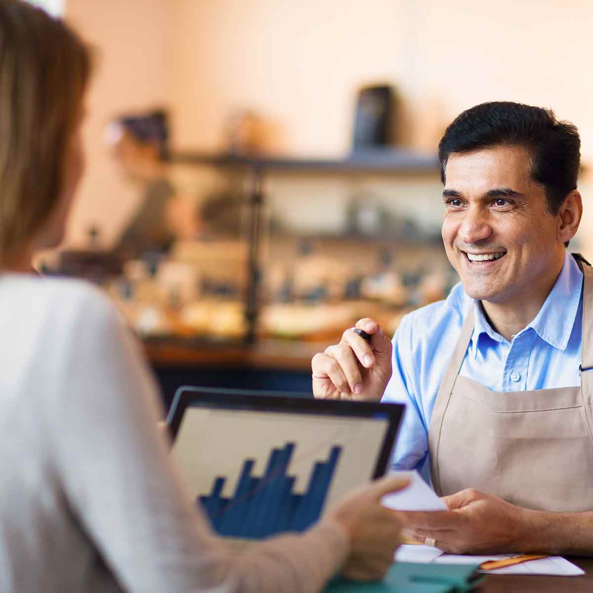Advisor discussing business valuation with a small business owner