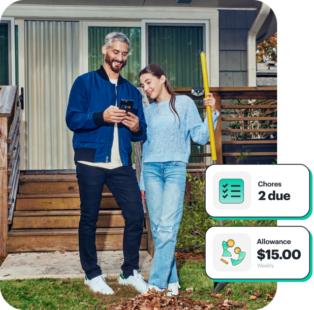 A father and daughter using the Greenlight app to complete chores to fund debit card for kids