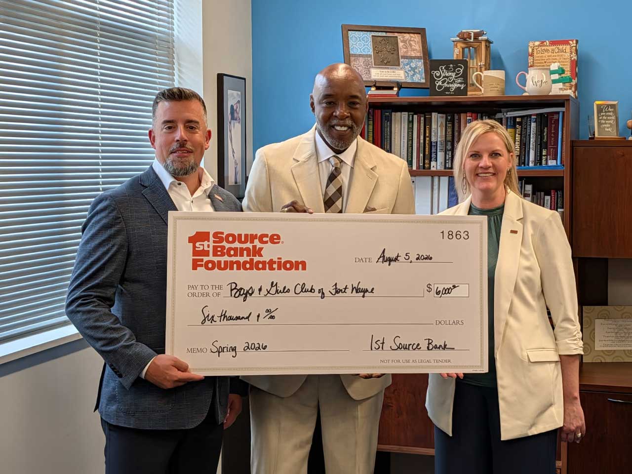 The 1st Source Bank Foundation donates a check to the Fort Wayne Boys and Girls Club